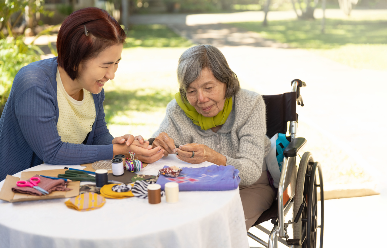 Caregiver doing an activity with a senior
